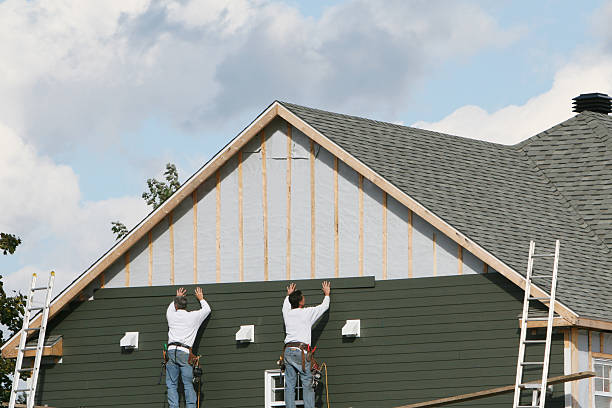 Professional Siding Repair technician working in Great River, NY